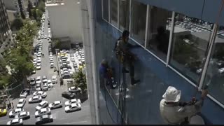 شستشوی نمای بیمارستان ولیعصر ناجا با طناب-آریا سازه ارتفاع البرز