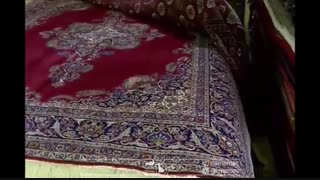 مستندی از فرش پشمی ابریشمی (فرش طرح فضای باز کاشان)